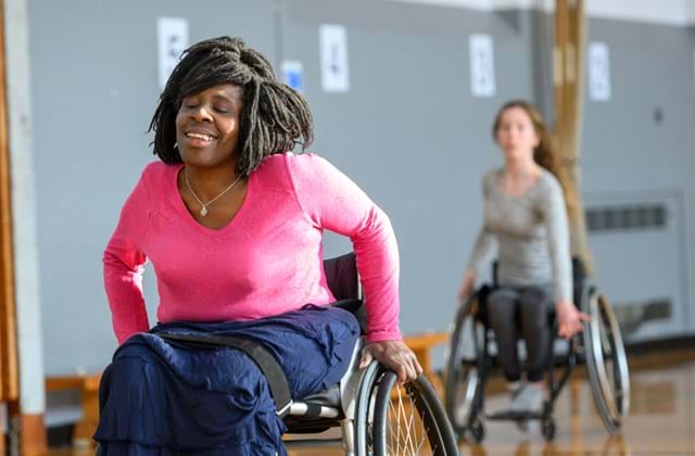 Women dancing in wheelchairs