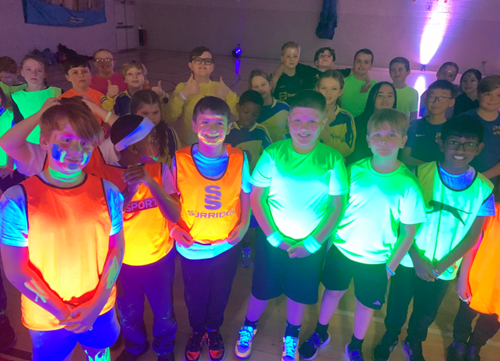 a group of children at a dodgeball event